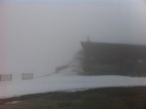 La gare d'arrivée dans le brouillard